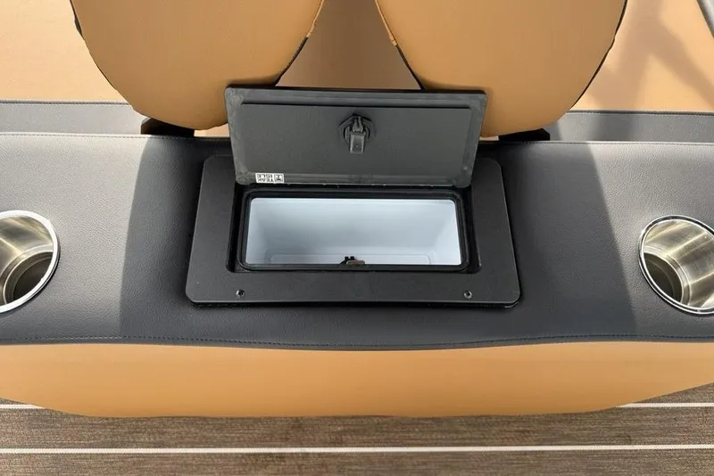 Slide: The Image of 2026 Premier 230 Sunsation boat seat with built-in storage and cup holders. - 27