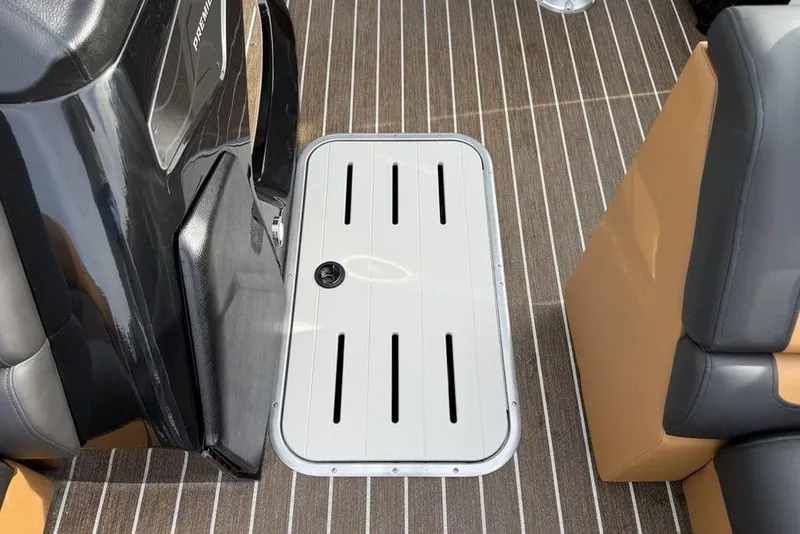 Slide: The Image of Interior of 2026 Premier 230 Sunsation boat with sleek flooring and seating. - 8