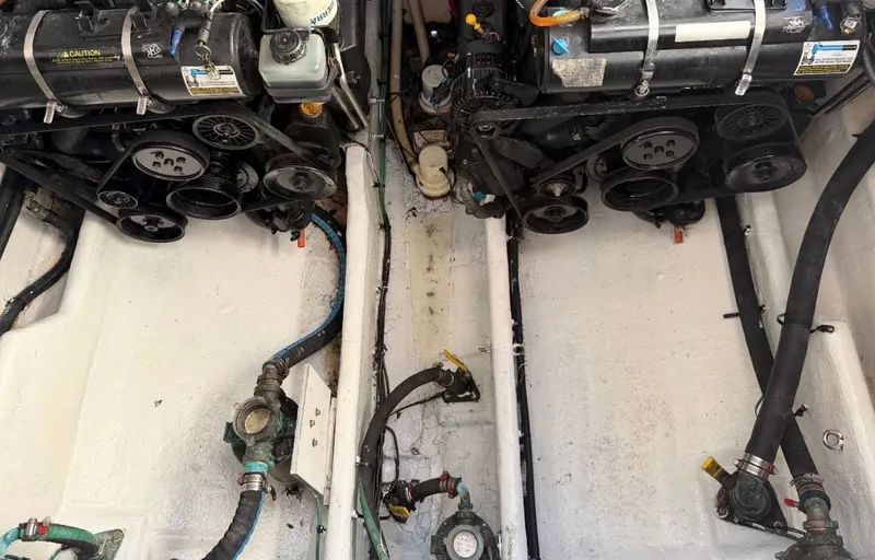 Slide: The Image of Engine compartment of a 2006 Sea Ray 290 Amberjack boat. - 26