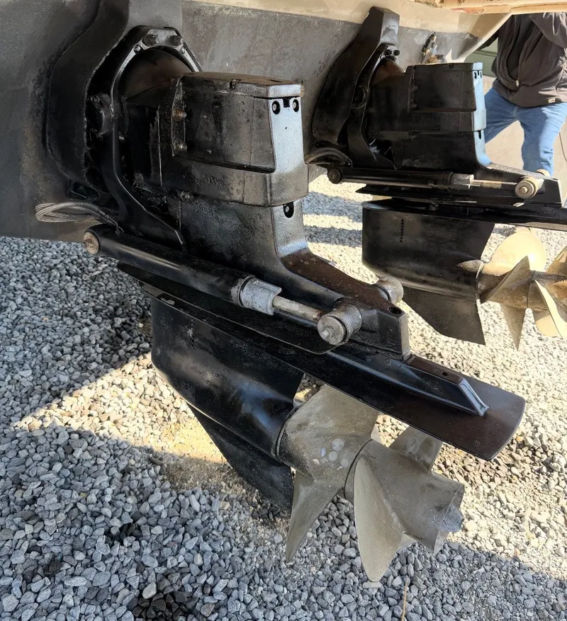 Slide: The Image of Engine compartment of 2006 Sea Ray 290 Amberjack with hoses and valves. - 27
