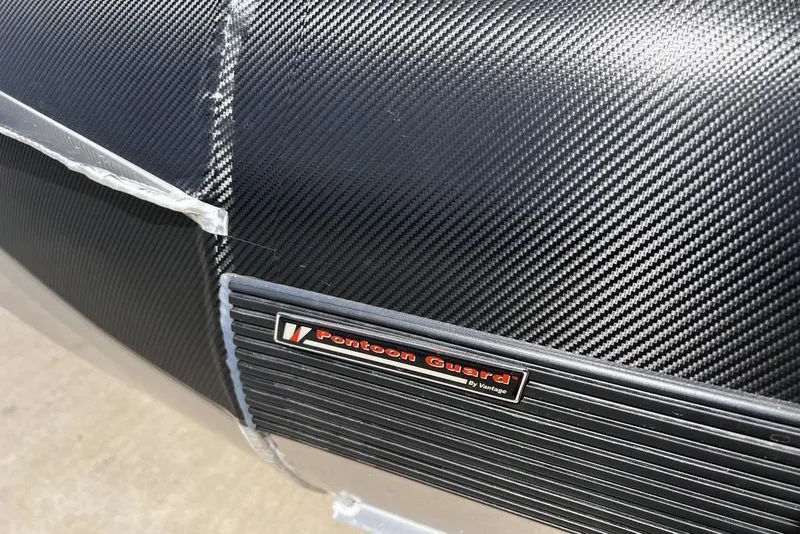 Slide: The Image of Carbon fiber detail on 2026 Premier 230 Solaris with Pontoon Guard label. - 10