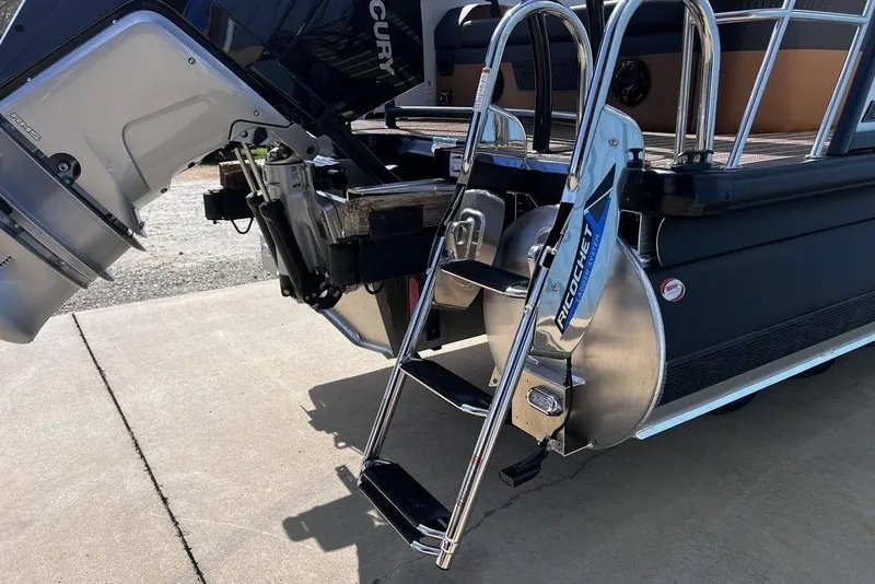 Slide: The Image of 2026 Premier 230 Solaris boat with Ricochet ladder and Mercury outboard motor. - 14