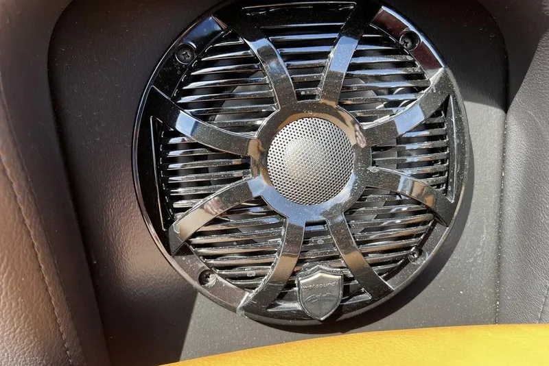 Slide: The Image of Close-up of a speaker in a 2026 Premier 230 Solaris boat interior. - 16