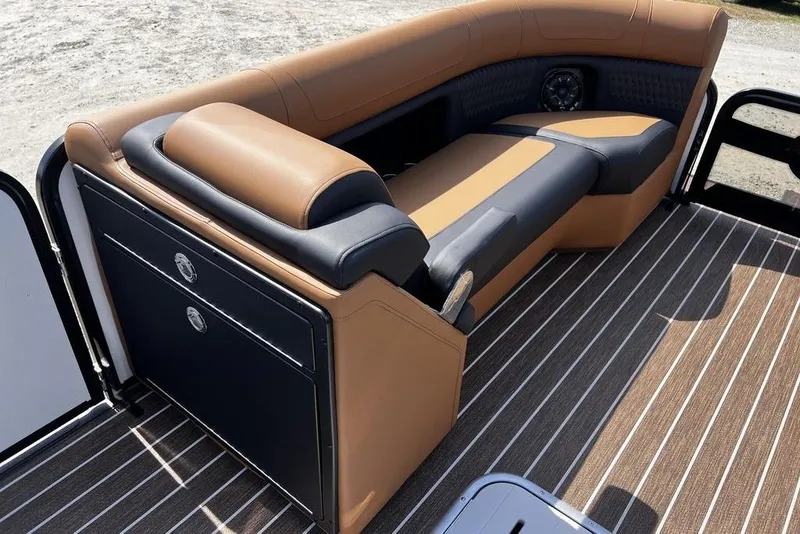 Slide: The Image of Luxurious seating on 2026 Premier 230 Solaris boat with stylish upholstery and striped flooring. - 17