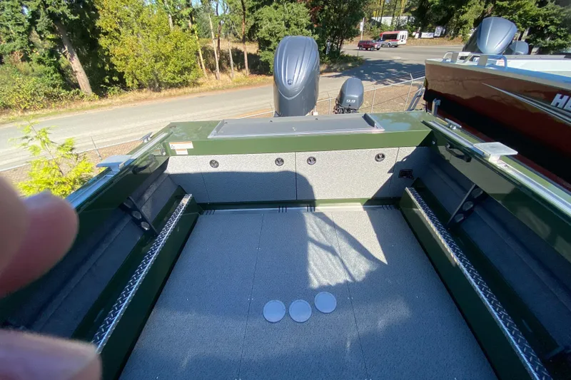 Slide: The Image of 2026 Hewescraft 200 ProV ET HT boat interior with spacious deck and protective canopy. - 4