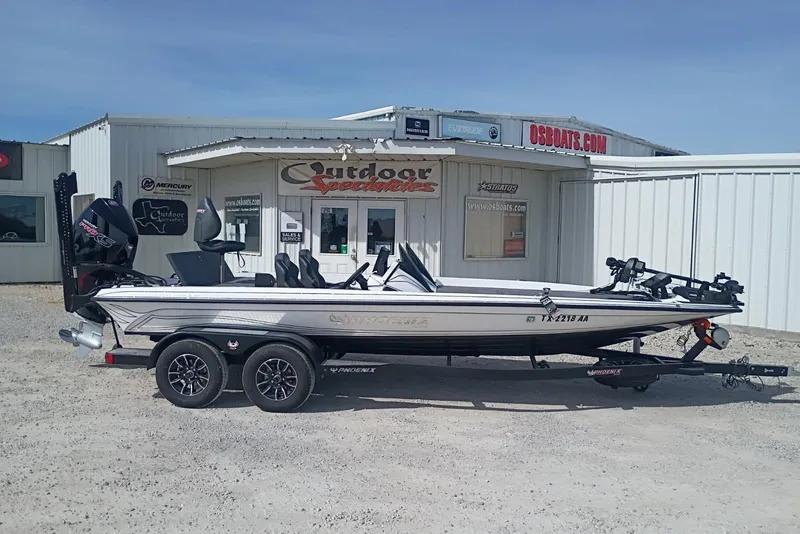 Slide: The Image of 2026 Phoenix 921 Elite X II boat on trailer outside dealership. - 0
