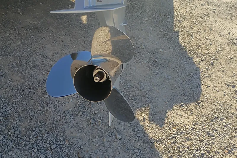 Slide: The Image of Shiny propeller of 2026 Phoenix 921 Elite X II on gravel surface. - 10