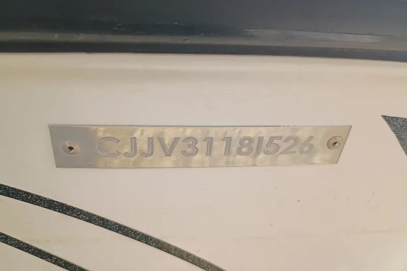 Slide: The Image of Metallic identification plate on Phoenix 921 Elite X II, 2026 model. - 12