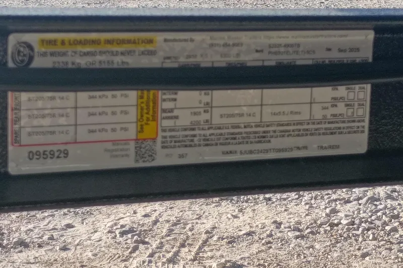 Slide: The Image of Tire and loading information label on Phoenix 921 Elite X II, 2026 model. - 13