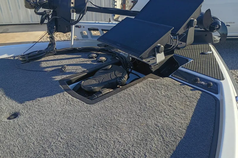 Slide: The Image of 2026 Phoenix 921 Elite X II boat deck with advanced control panel and equipment. - 5