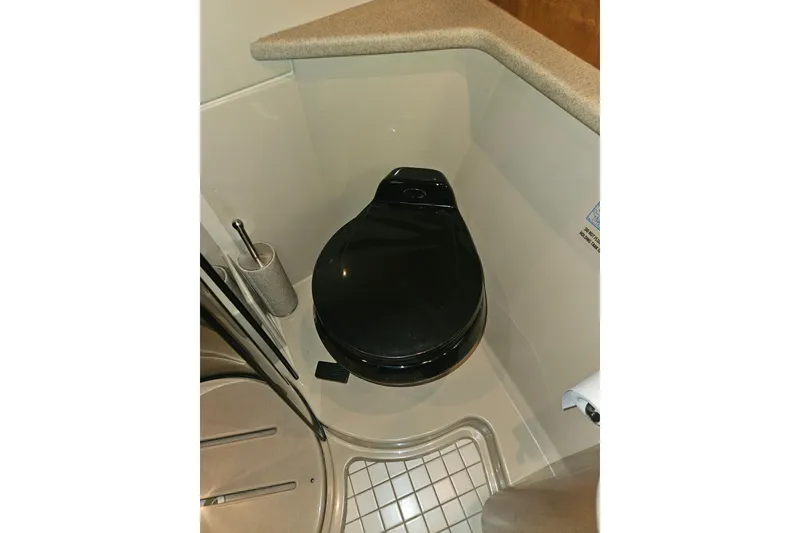 Slide: The Image of Luxurious bathroom in 2000 Cruisers Yachts 4450 Express Motoryacht with modern amenities. - 50