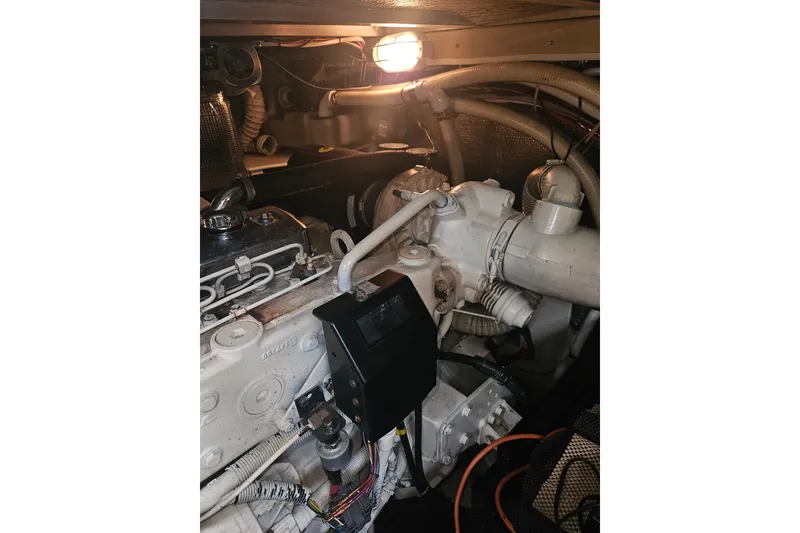 Slide: The Image of Shower area in 2000 Cruisers Yachts 4450 Express Motoryacht, featuring modern fixtures. - 54