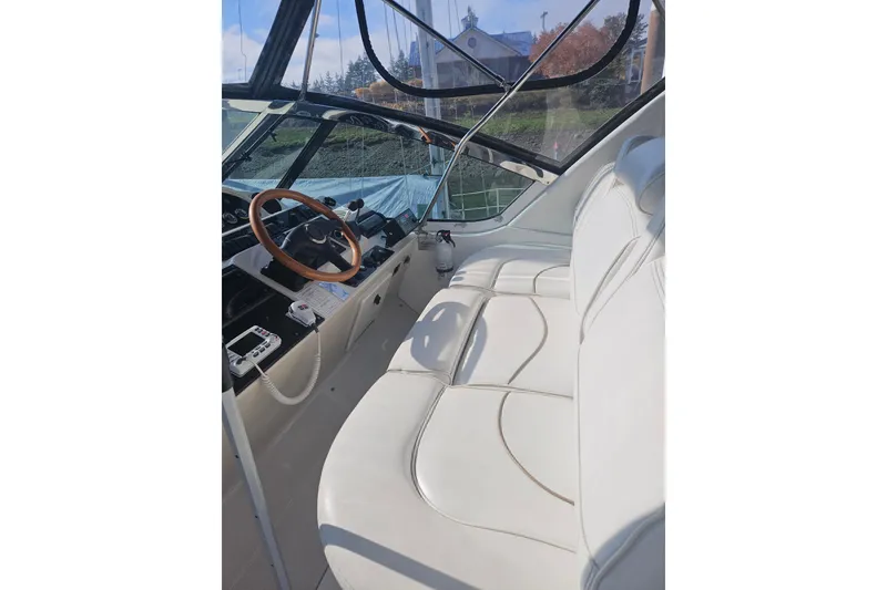 Slide: The Image of 2000 Cruisers Yachts 4450 Express Motoryacht interior with sink and counter area. - 13