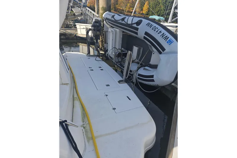 Slide: The Image of Engine room of 2000 Cruisers Yachts 4450 Express Motoryacht with storage containers and equipment. - 58