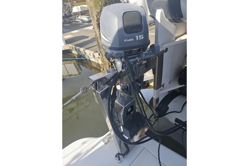 Slide: The Image of Outboard motor on 2000 Cruisers Yachts 4450 Express Motoryacht, docked at marina. - 62