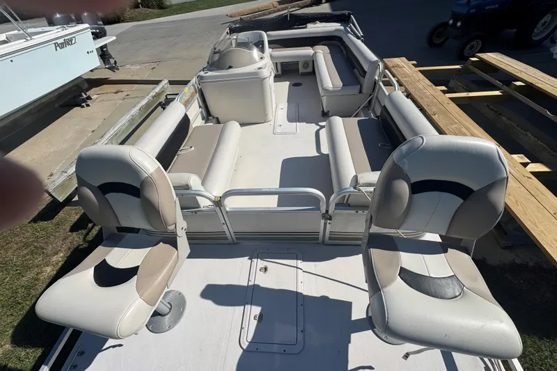 Slide: The Image of 2003 Hurricane FunDeck 226 boat with spacious seating and modern design. - 4