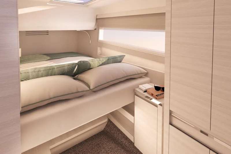Slide: The Image of Luxurious 2025 Harris-Kayot 41 yacht cabin with modern bedding and sleek storage. - 15