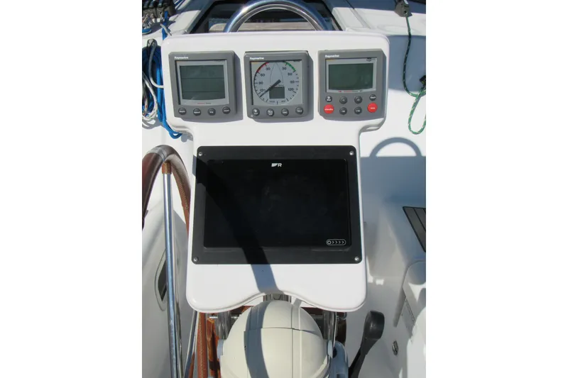 Slide: The Image of Control panel of 2005 Beneteau Oceanis 373 sailboat with navigation instruments. - 8