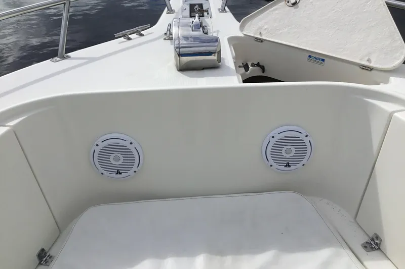 Slide: The Image of 2007 Pursuit C 280 Center Console boat interior with speakers and storage compartment. - 19