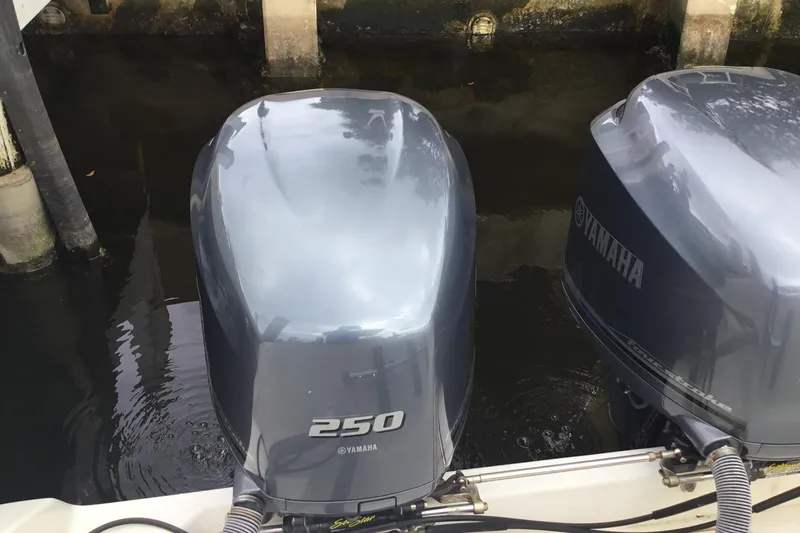 Slide: The Image of Twin Yamaha 250 outboard engines on a 2007 Pursuit C 280 Center Console boat. - 45