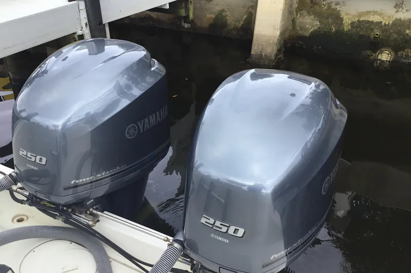 Slide: The Image of Twin Yamaha 250 outboard engines on a 2007 Pursuit C 280 Center Console boat. - 47