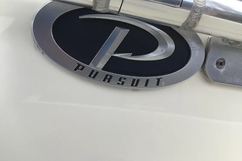 Slide: The Image of Close-up of 2007 Pursuit C 280 Center Console logo emblem. - 49