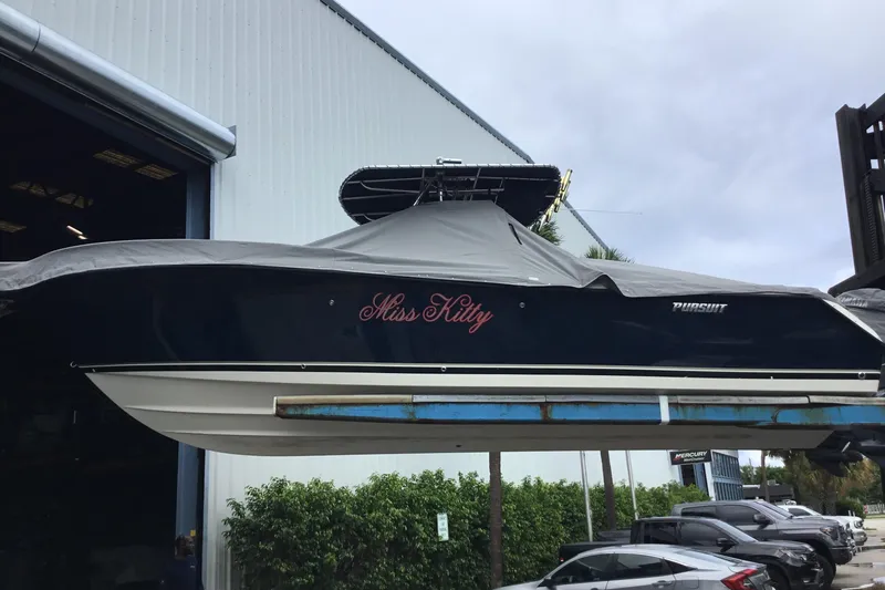 Slide: The Image of 2007 Pursuit C 280 Center Console boat named "Miss Kitty" in storage. - 51