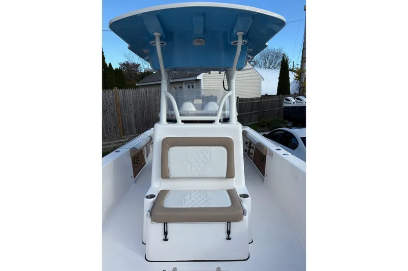 Slide: The Image of Manufacturer Provided Image: 2025 Sea Born LX26 Center Console boat dashboard with dual screens and steering wheel. - 10
