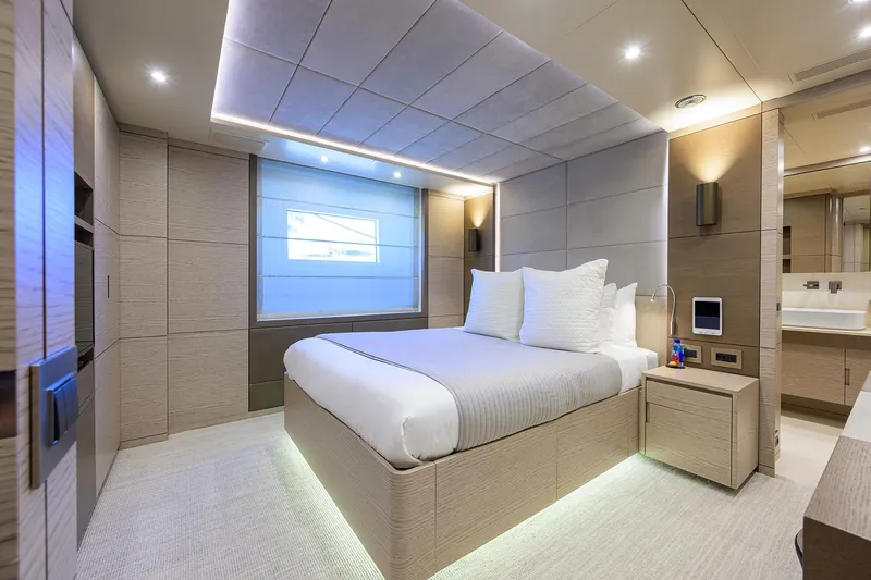 Slide: The Image of Luxurious bedroom interior on 2016 Benetti 132 Classic Supreme yacht, featuring modern design and ambient lighting. - 20