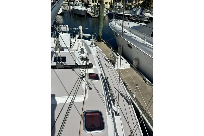 Slide: The Image of Catalina 320 sailboat deck view, docked in marina, 2008 model. - 12