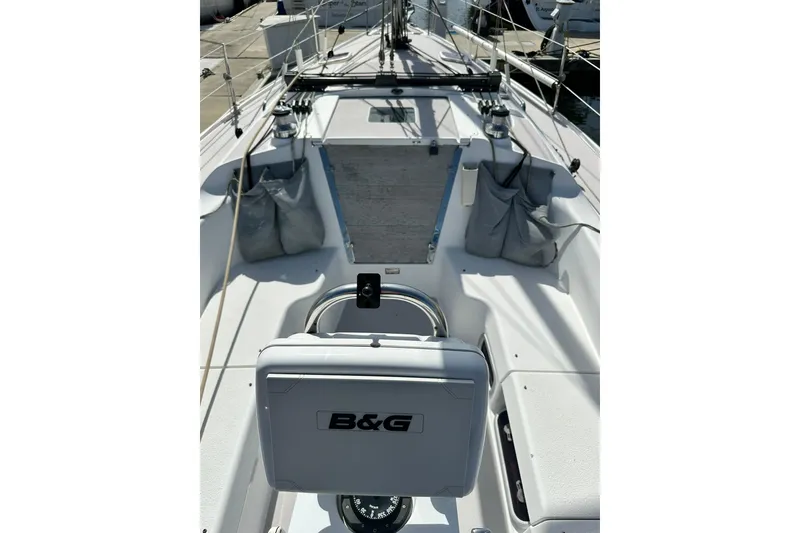 Slide: The Image of 2008 Catalina 320 sailboat cockpit with B&G navigation system, docked at marina. - 15