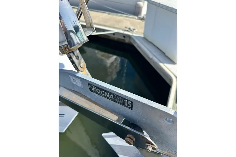 Slide: The Image of Catalina 320 sailboat anchor detail, Rocna 15, docked in marina, 2008 model. - 5