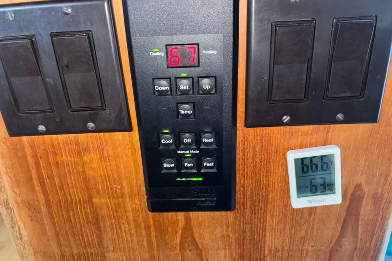 Slide: The Image of Bathroom interior of 1993 Carver 350 Voyager yacht with shower and toiletries. - 26