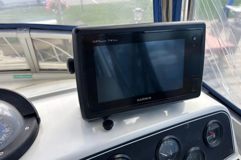 Slide: The Image of Garmin GPSMAP 741xs on 1993 Carver 350 Voyager dashboard. - 32