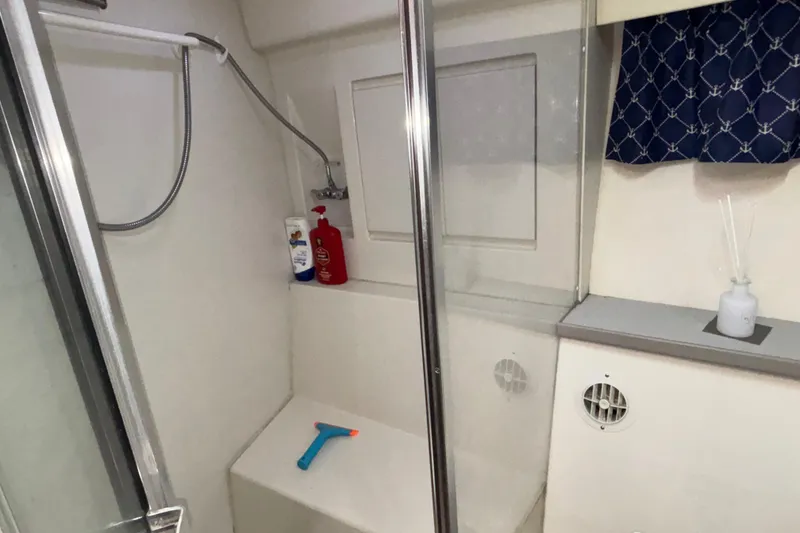 Slide: The Image of Bathroom interior of 1993 Carver 350 Voyager yacht with sink and toilet. - 25