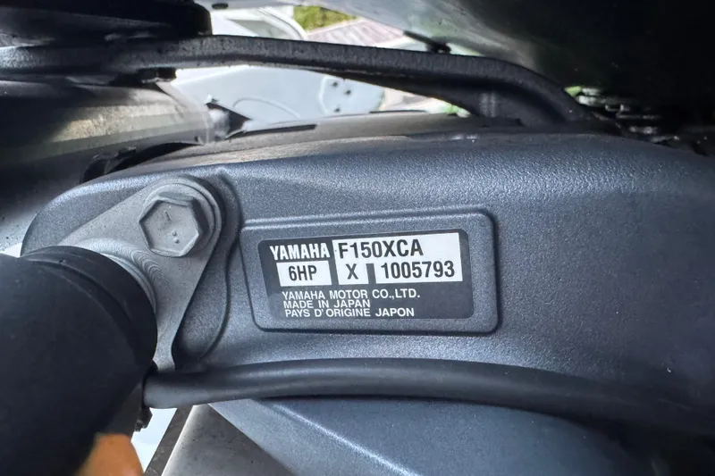 Slide: The Image of Yamaha F150XCA engine label on 2021 Sea Hunt Gamefish 25 boat. - 8