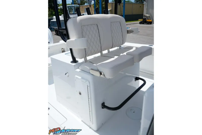 Slide: The Image of 2026 Sea Hunt Gamefish 30 Coffin Box boat seating with white cushioned seats. - 11