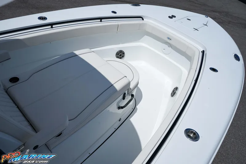 Slide: The Image of 2026 Sea Hunt Gamefish 30 Coffin Box boat interior with seating and storage. - 18
