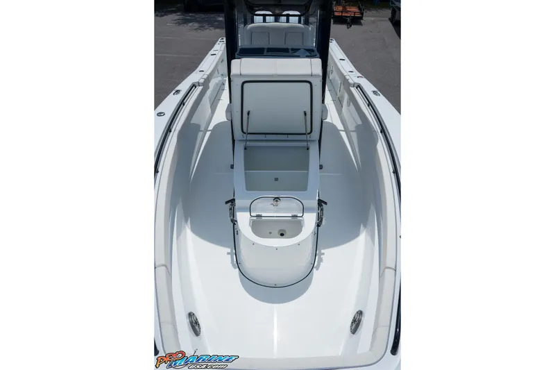 Slide: The Image of 2026 Sea Hunt Gamefish 30 Coffin Box boat interior with open storage compartments. - 21