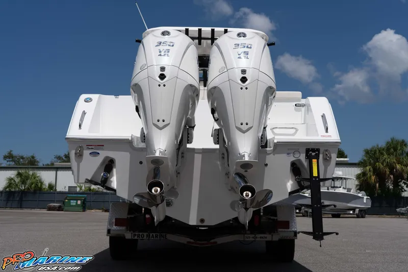 Slide: The Image of 2026 Sea Hunt Gamefish 30 Coffin Box with dual outboard engines, rear view. - 38