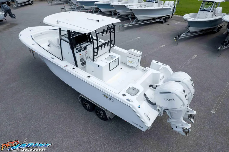 Slide: The Image of 2026 Sea Hunt Gamefish 30 Coffin Box boat with dual Yamaha engines on display. - 40