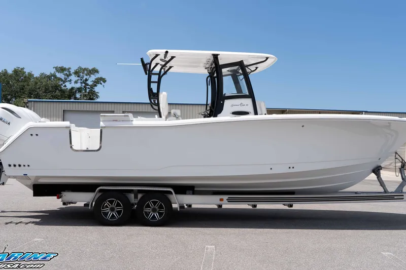 Slide: The Image of 2026 Sea Hunt Gamefish 30 Coffin Box boat on trailer, side view. - 43
