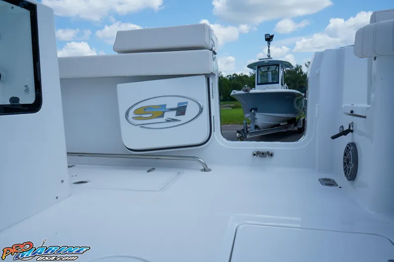 Slide: The Image of 2026 Sea Hunt Gamefish 30 Coffin Box boat interior, featuring sleek design and logo. - 6