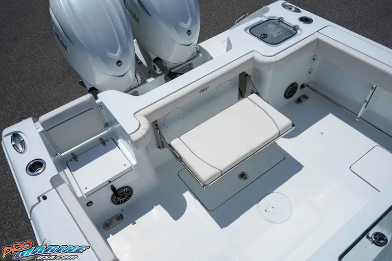 Slide: The Image of 2026 Sea Hunt Gamefish 30 Coffin Box boat with dual engines and spacious seating area. - 7