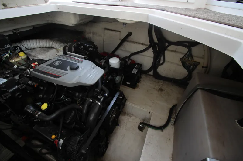 Slide: The Image of Engine compartment of a 2008 Rinker 330 Express Cruiser boat. - 45