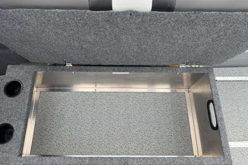 Slide: The Image of Open storage compartment in 2026 Lund 185 Heavy Gauge boat interior. - 22