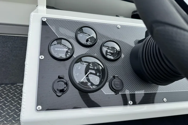 Slide: The Image of Dashboard of 2026 Lund 185 Heavy Gauge boat with gauges and controls. - 27