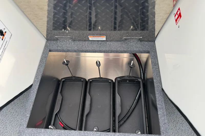 Slide: The Image of Battery compartment of 2026 Lund 185 Heavy Gauge boat, featuring secure storage. - 35