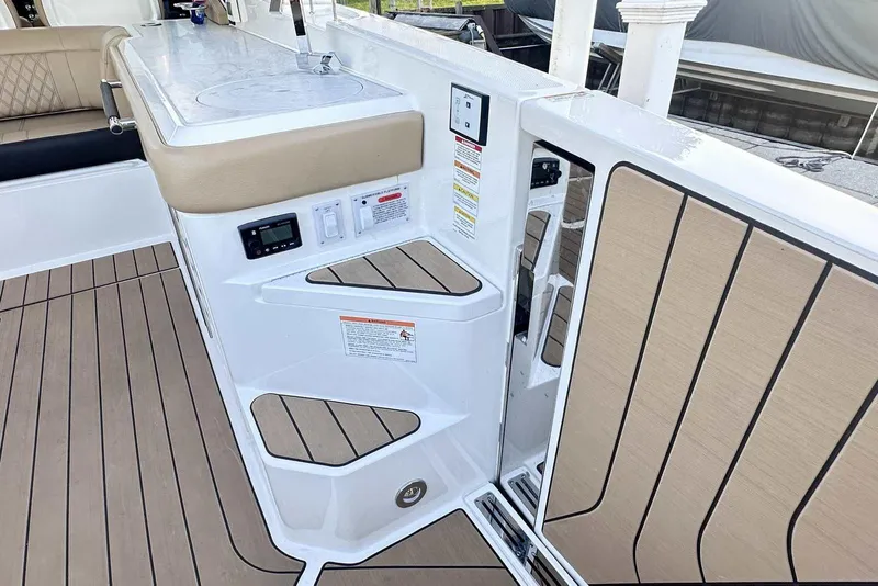 Slide: The Image of 2024 Sea Ray SLX 400 boat interior with sleek design and modern amenities. - 10