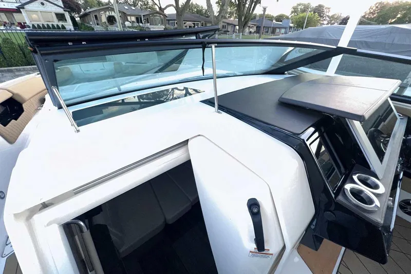 Slide: The Image of 2024 Sea Ray SLX 400 boat cockpit with sleek design and modern controls. - 42